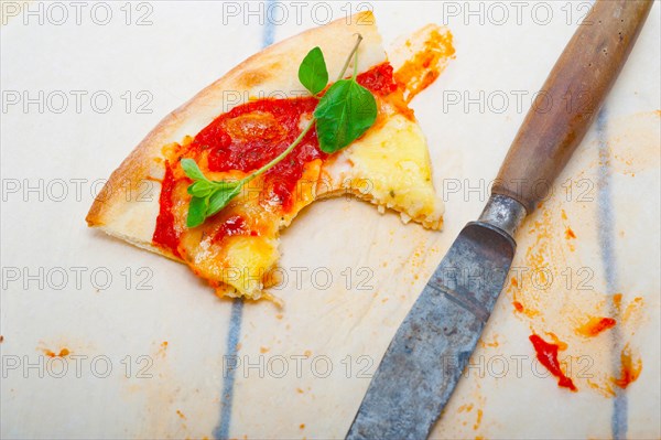 Italian traditional pizza Margherita tomato mozzarella and basil