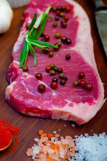 Raw uncooked ribeye beef steak butcher selection