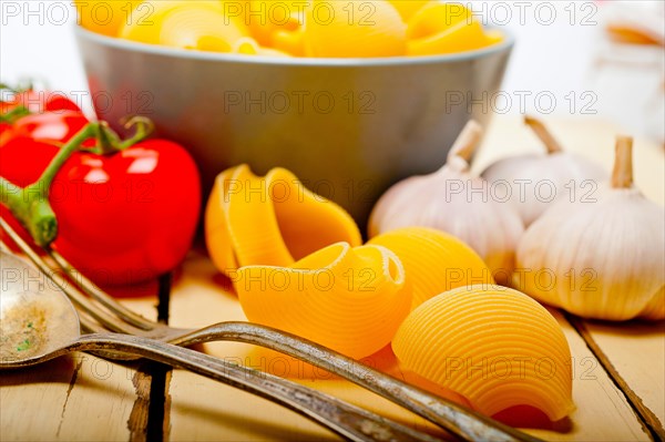 Italian snail lumaconi pasta with ripe cherry tomatoes sauce ingredients