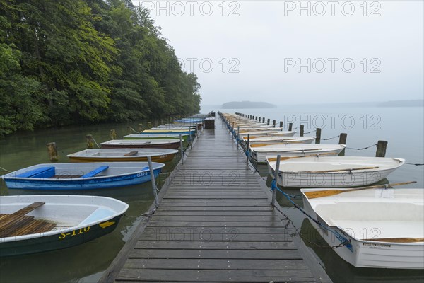 Boats on the lake shore in the morning