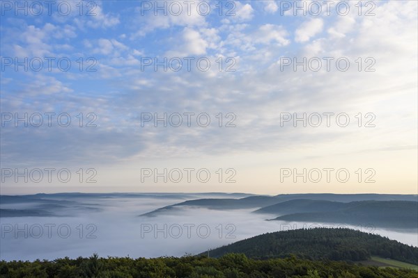 View from Katzenbuckel mountain with morning mist