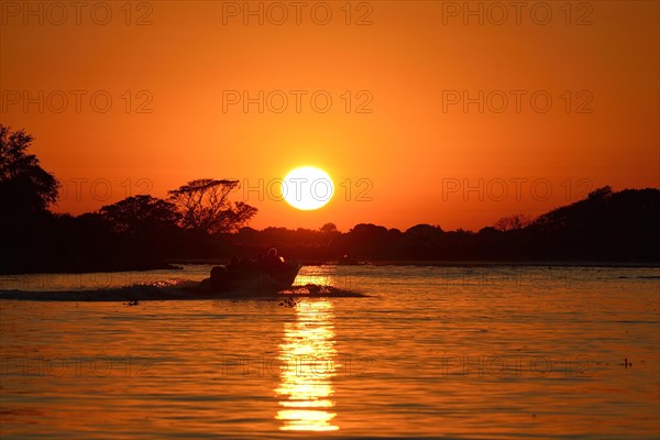 Tourist boat on the Rio Sao Lourenco at sunrise