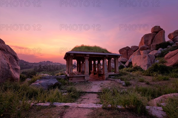 Ancient ruins in Hampi on sunset. Above Hampi Bazaar