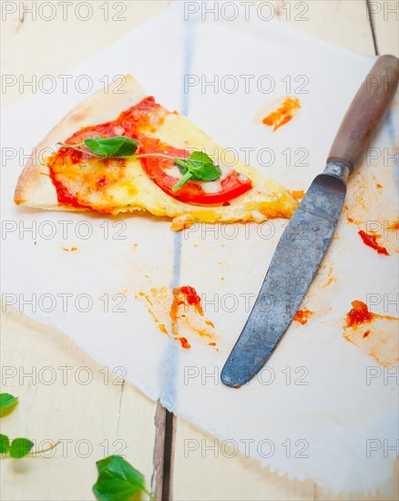 Italian traditional pizza Margherita tomato mozzarella and basil