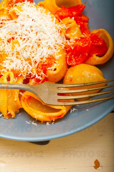 Italian snail lumaconi pasta with ripe cherry tomatoes sauce ingredients