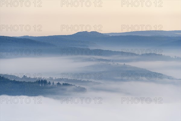 View from Katzenbuckel mountain with morning mist