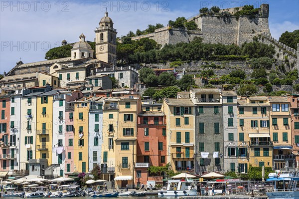 Pastel-coloured house facades in the harbour of Portovenere