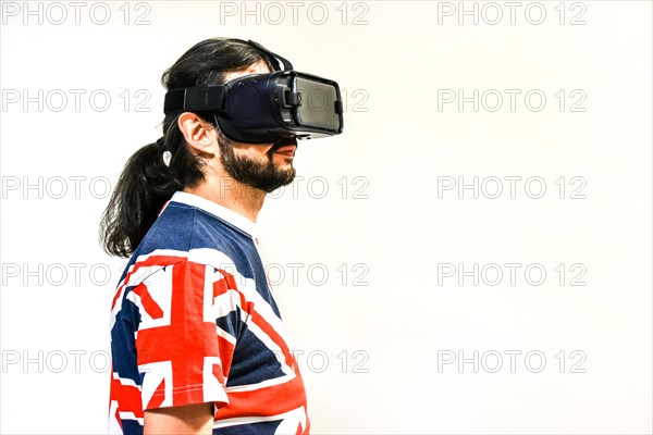 Man on white background with Virtual Reality headsets on