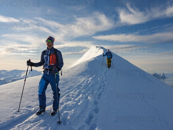 Two climbers on the summit ridge of Husafjellet