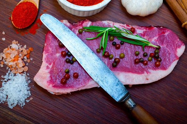 Raw uncooked ribeye beef steak butcher selection