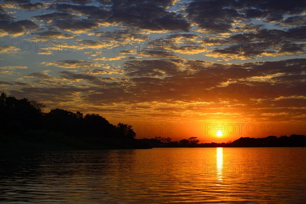 Sunrise with clouds over the Rio Sao Lourenco