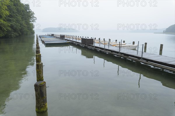 Boats on the lake shore in the morning