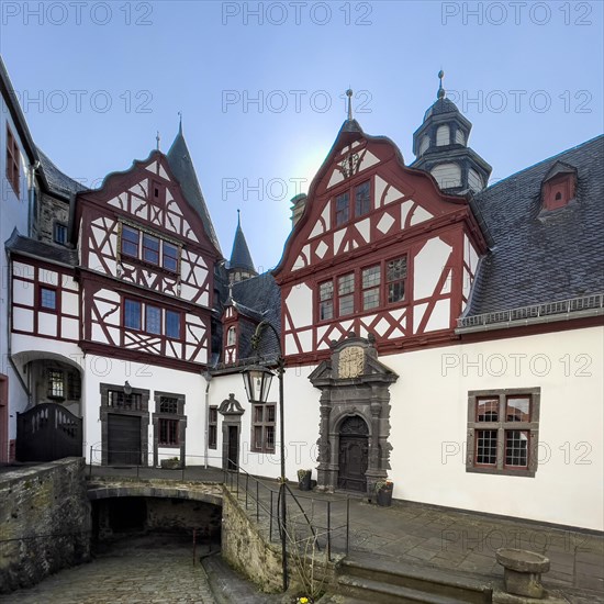 View from castle courtyard to buildings of Trier castle in double castle Buerresheim from the Middle Ages