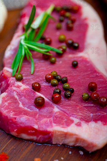 Raw uncooked ribeye beef steak butcher selection