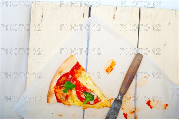 Italian traditional pizza Margherita tomato mozzarella and basil