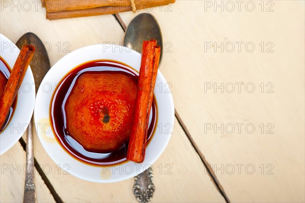 Poached pears delicious home made recipe ove white rustic wood table