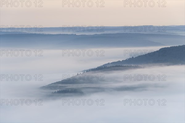 View from Katzenbuckel mountain with morning mist