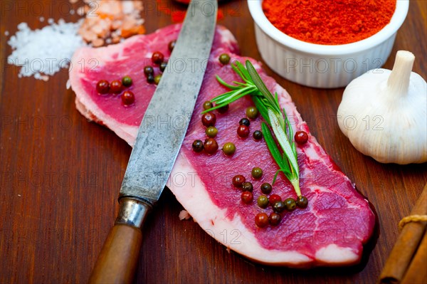 Raw uncooked ribeye beef steak butcher selection