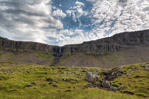 Small waterfall on high cliffs