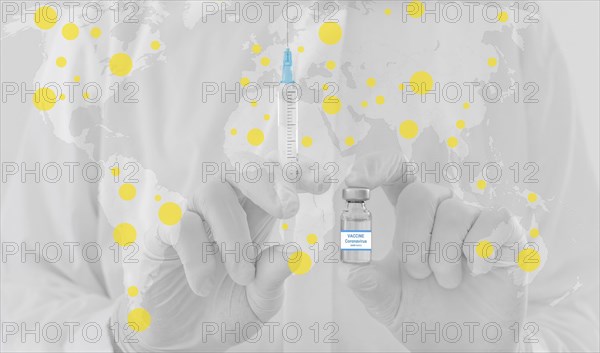 World map and doctor hands holding a vaccine bottle and syringe