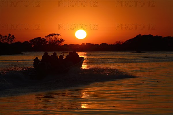 Tourist boat on the Rio Sao Lourenco at sunrise