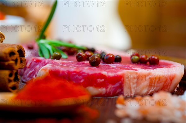 Raw uncooked ribeye beef steak butcher selection