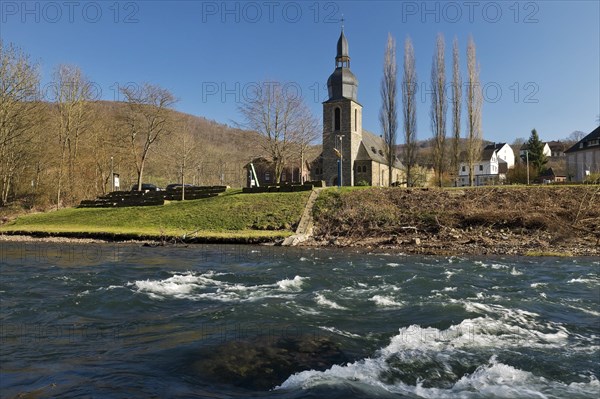 The River Lenne with the Church of St. Joseph in Nachrodt