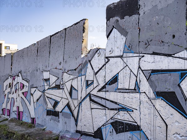 Graffiti on wall remains behind the Urban Gardening project at a new development area at the Old Harbour