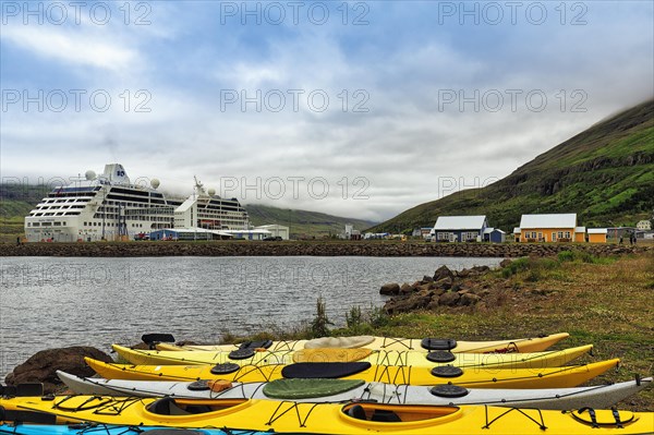 Colourful Kayaks on the Shore of the Fjord