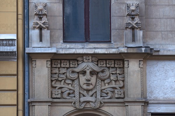 Art Nouveau ornament above an entrance to a town house