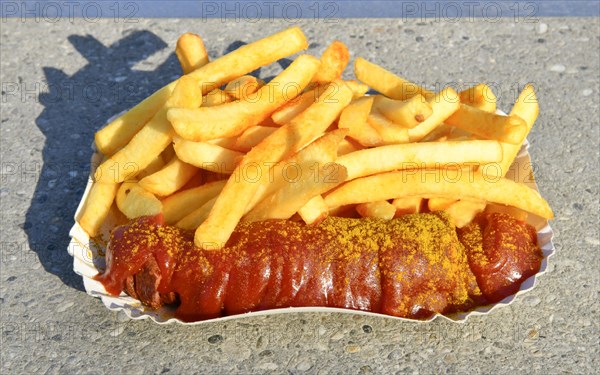 Curry sausage with fries