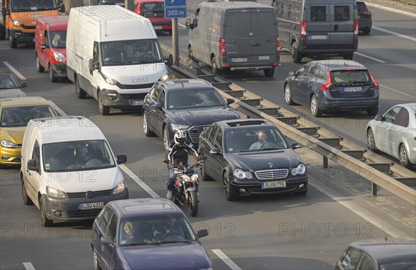 Motorbike column jumping weaving through overtaking