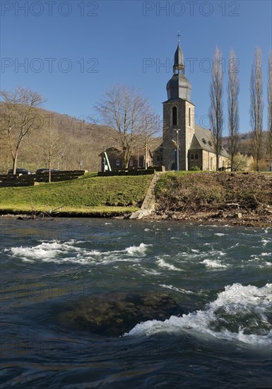 The River Lenne with the Church of St. Joseph in Nachrodt