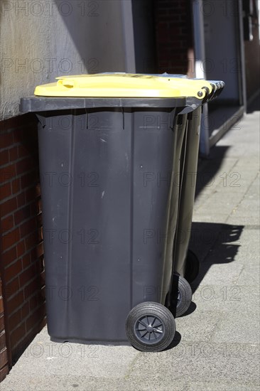 Yellow bin for plastic waste