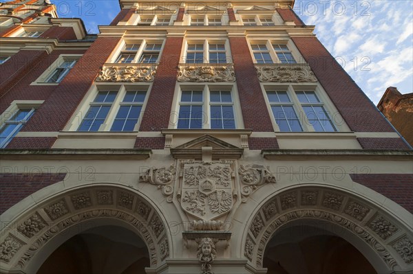 Main facade of the primary school with the old city coat of arms of Goerlitz