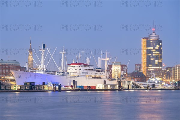 Landungsbruecken Hamburg at blue hour with museum cargo ship Cap San Diego