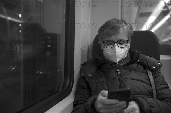 Elderly woman with face mask