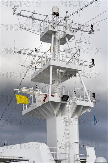 Cruise ship with yellow flag