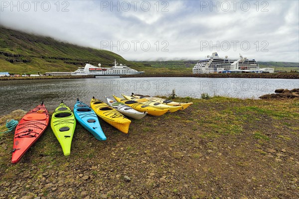 Colourful Kayaks on the Shore of the Fjord