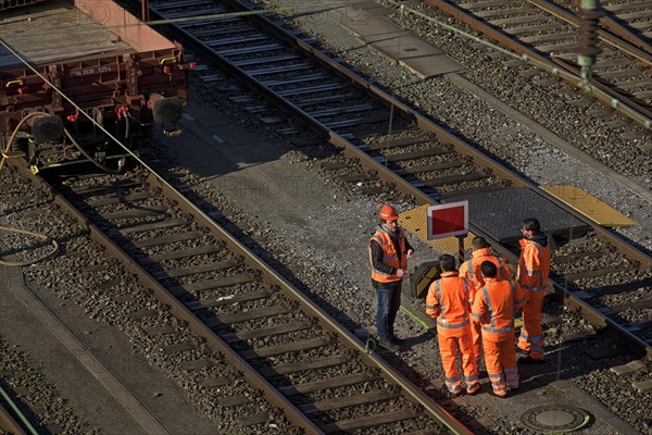 Railway workers talking at the train formation plant in the Vorhalle district