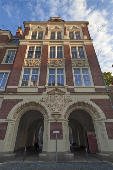 Main facade of the primary school with the old city coat of arms of Goerlitz