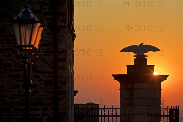 Sunset behind the portal of Bensberg Castle