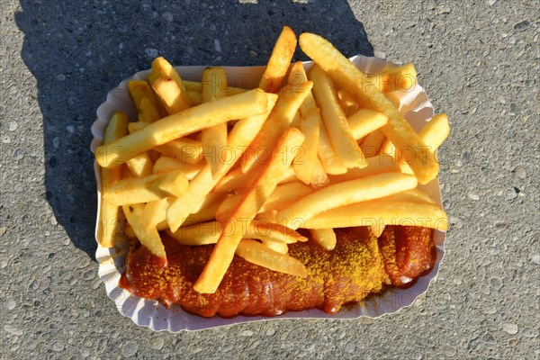 Curry sausage with fries