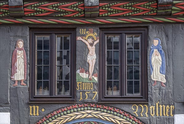 Depiction of the crucified Christ above the portal of the Adam- und Evahaus