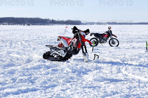 Motorized snowbike on a frozen surface