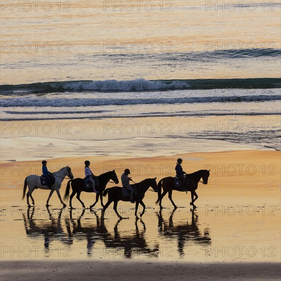 Riders on the beach