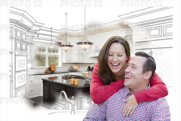 Happy laughing couple with kitchen design drawing and photo behind