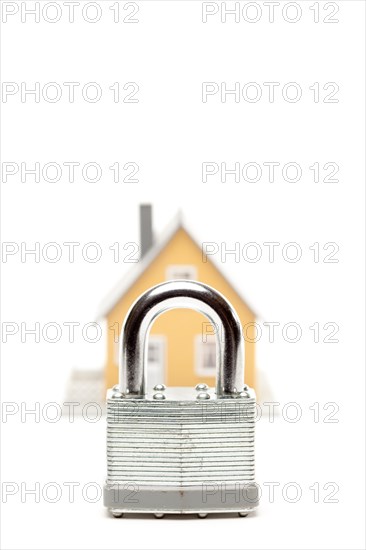 Lock and house isolated on a white background