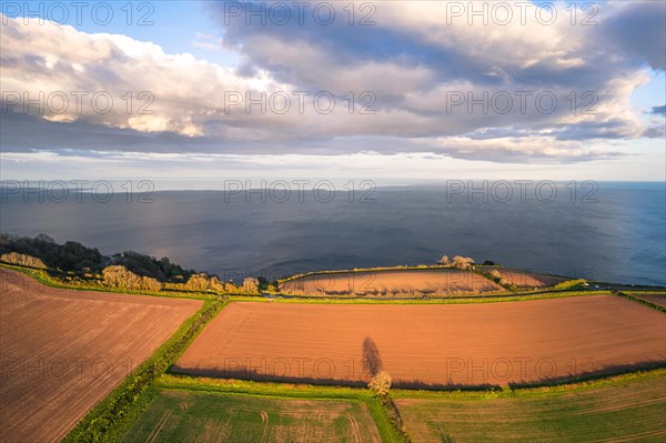 Devon Fields and Farmlands at sunset time from a drone over Labrador Bay