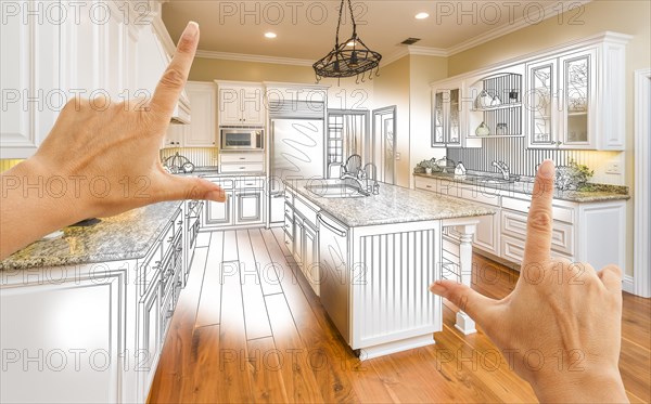Female hands framing custom kitchen design drawing and photo combination